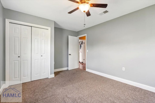 1019 Bacon Rd, Hinesville, GA 31313 - unfurnished bedroom with carpet floors, baseboards, a closet, and ceiling fan