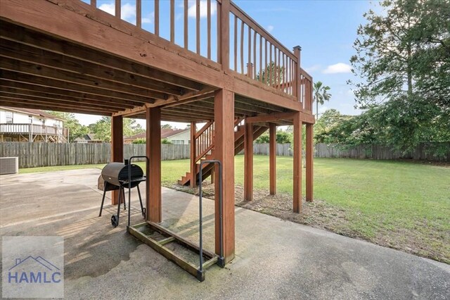 1019 Bacon Rd, Hinesville, GA 31313 - view of patio with stairs, a grill, and a wooden deck