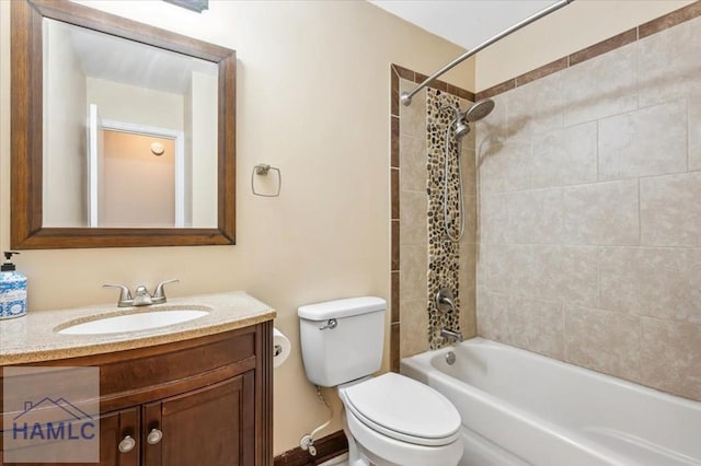 1019 Bacon Rd, Hinesville, GA 31313 - bathroom featuring vanity, toilet, shower / bath combination, and baseboards