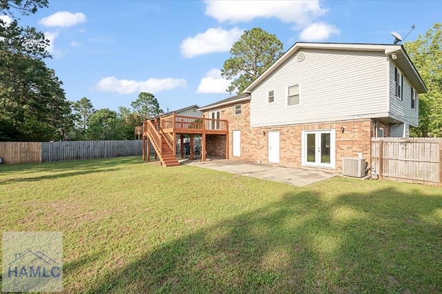 1019 Bacon Rd, Hinesville, GA 31313 - back of house with french doors, central AC, brick siding, stairway, and a wooden deck