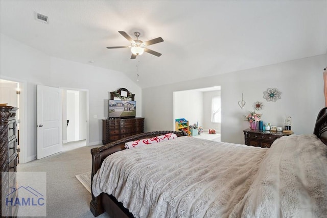 bedroom featuring carpet flooring, a ceiling fan, baseboards, lofted ceiling, and visible vents