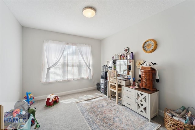 rec room featuring carpet flooring and baseboards