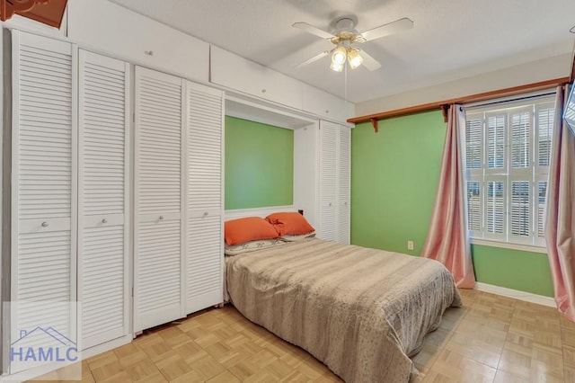 bedroom featuring light parquet flooring and ceiling fan