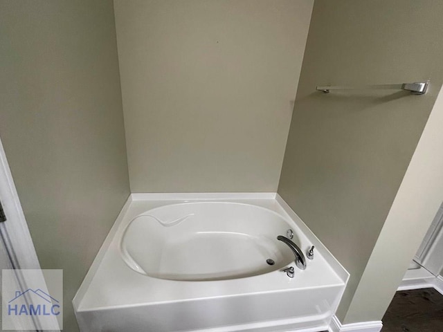 bathroom featuring a tub