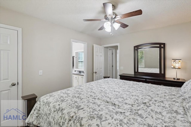 128 W Kenny Dr, Hinesville, GA 31313 - bedroom with ceiling fan and a textured ceiling
