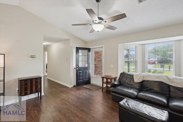 128 W Kenny Dr, Hinesville, GA 31313 - living area with wood finished floors, vaulted ceiling, and a ceiling fan
