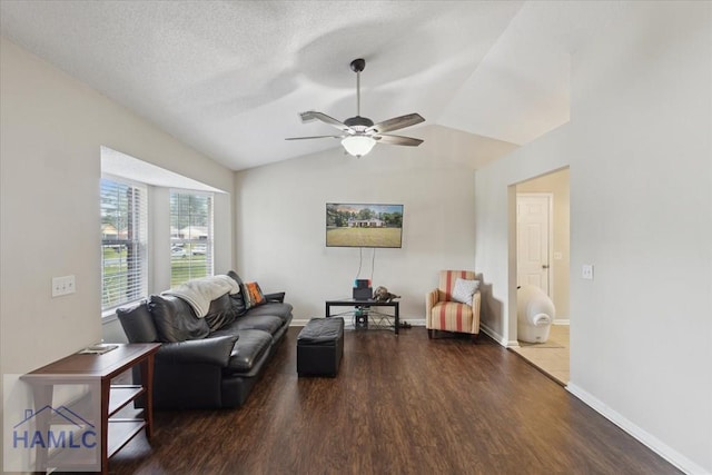 128 W Kenny Dr, Hinesville, GA 31313 - living area featuring wood finished floors, a ceiling fan, lofted ceiling, and a textured ceiling