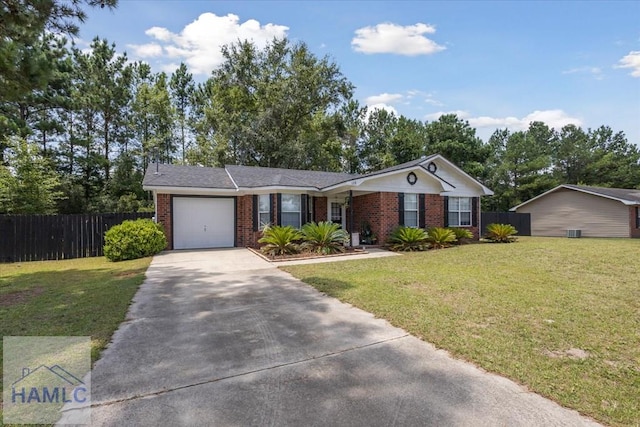 128 W Kenny Dr, Hinesville, GA 31313 - single story home with brick siding, concrete driveway, and an attached garage