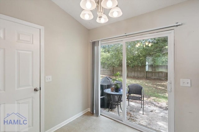 128 W Kenny Dr, Hinesville, GA 31313 - doorway with baseboards and a chandelier