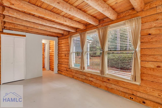 interior space with beamed ceiling and wooden ceiling