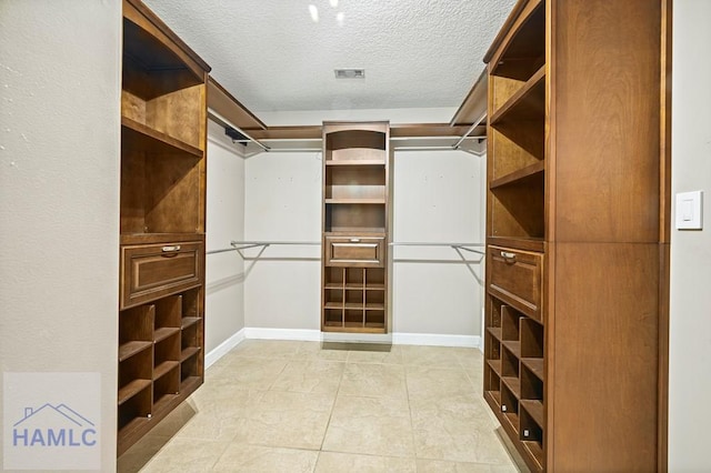 3638 Tibet Rd, Ludowici, GA 31316 - walk in closet featuring light tile patterned floors