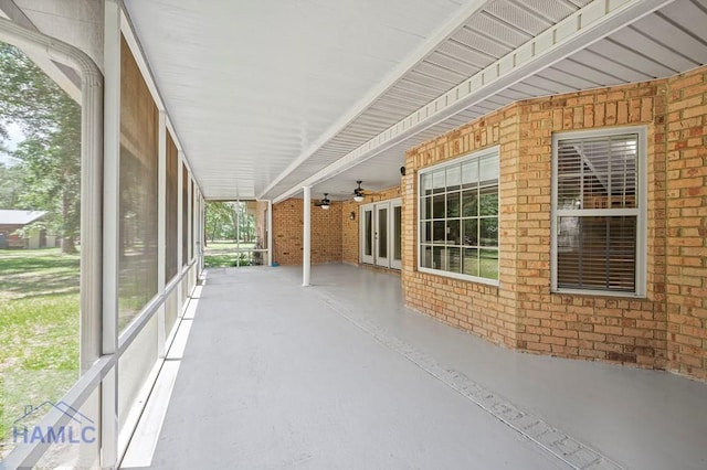 3638 Tibet Rd, Ludowici, GA 31316 - unfurnished sunroom featuring french doors and a ceiling fan