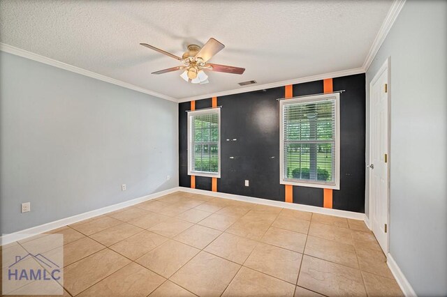 3638 Tibet Rd, Ludowici, GA 31316 - tiled spare room with crown molding, a ceiling fan, and a textured ceiling