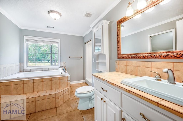 3638 Tibet Rd, Ludowici, GA 31316 - bathroom with a bath, vanity, tile patterned flooring, crown molding, and decorative backsplash