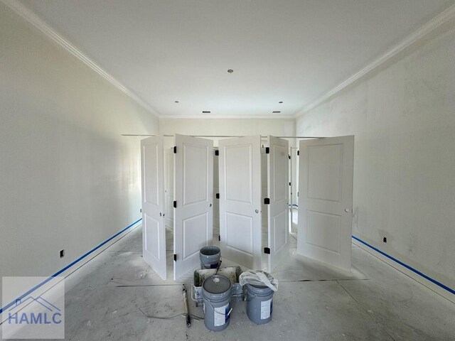 47 Ennis Rd, Pembroke, GA 31321 - unfurnished bedroom with ornamental molding and unfinished concrete floors