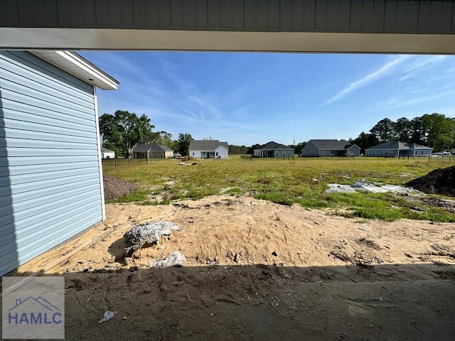 47 Ennis Rd, Pembroke, GA 31321 - view of yard with a residential view