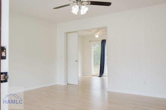 unfurnished room featuring light hardwood / wood-style flooring and ceiling fan