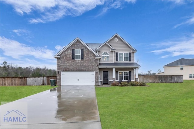 traditional home with brick siding, a front lawn, and fence