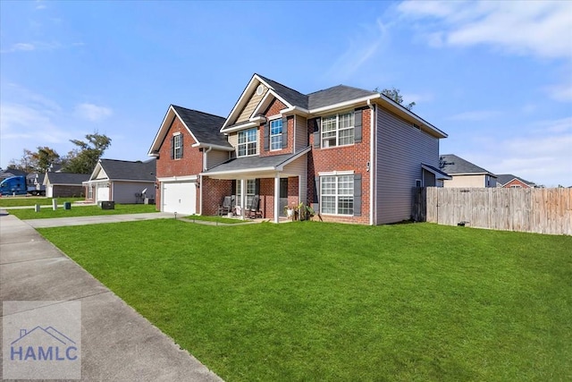 view of front of house with a porch, a front yard, and a garage