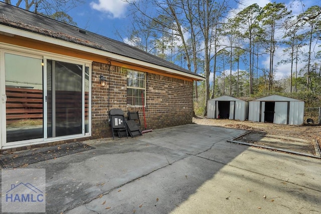 view of patio with a storage shed