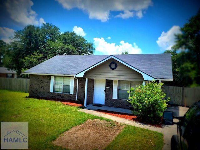 1441 Coalition Cir, Hinesville, GA 31313 - view of front of house featuring brick siding, a porch, and roof with shingles