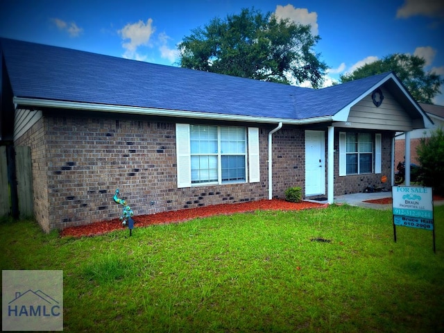 1441 Coalition Cir, Hinesville, GA 31313 - ranch-style home with brick siding and a front yard
