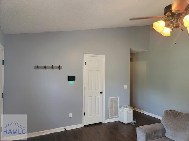 1441 Coalition Cir, Hinesville, GA 31313 - living area with a ceiling fan, vaulted ceiling, and dark wood finished floors