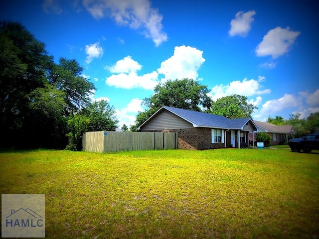 1441 Coalition Cir, Hinesville, GA 31313 - view of home's exterior featuring brick siding