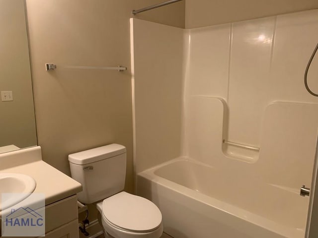 full bathroom with shower / bathing tub combination, vanity, and toilet