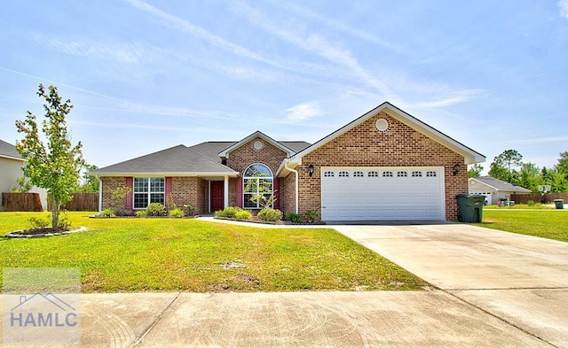 view of front facade with a garage and a front lawn