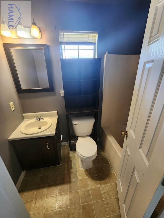 1302 Loblolly Dr, Hinesville, GA 31313 - full bath featuring vanity, a bath, and tile patterned floors