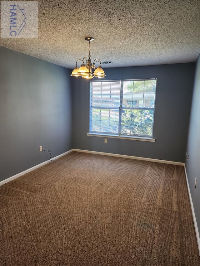 1302 Loblolly Dr, Hinesville, GA 31313 - spare room featuring carpet floors, a chandelier, and a textured ceiling