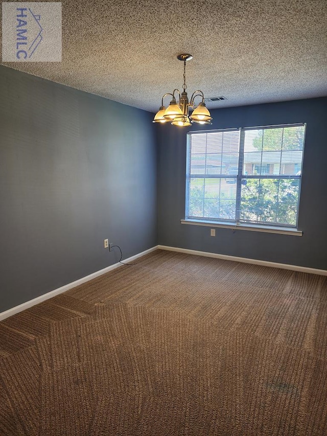 1302 Loblolly Dr, Hinesville, GA 31313 - unfurnished room featuring carpet floors, a chandelier, and a textured ceiling