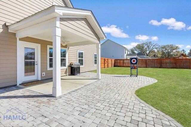 view of yard with a fenced backyard