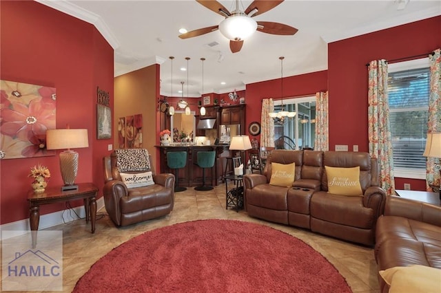 655 Littlefield St, Jesup, GA 31546 - living area featuring tile patterned floors, visible vents, ceiling fan with notable chandelier, and ornamental molding