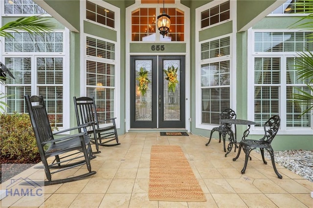 655 Littlefield St, Jesup, GA 31546 - view of exterior entry with stucco siding