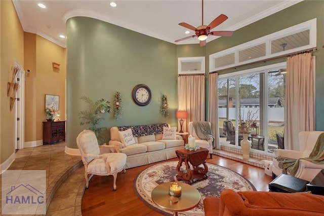 655 Littlefield St, Jesup, GA 31546 - living area featuring ceiling fan, ornamental molding, and a high ceiling
