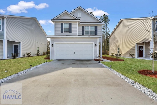 view of front of property featuring board and batten siding, a front yard, driveway, and an attached garage