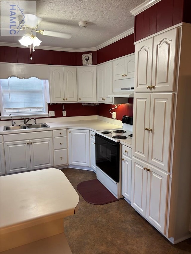 kitchen featuring electric stove, ceiling fan, sink, white cabinets, and dark colored carpet