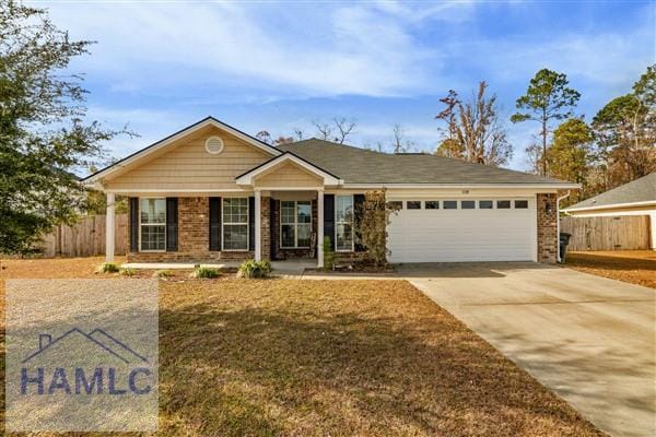 single story home featuring covered porch and a garage