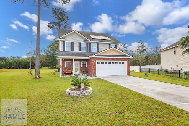 view of front facade with a front yard, solar panels, and a garage