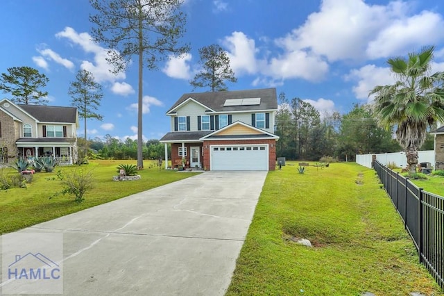 view of front facade with solar panels, a garage, and a front yard