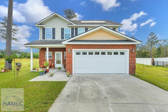 view of front of property with solar panels, a porch, a garage, and a front lawn