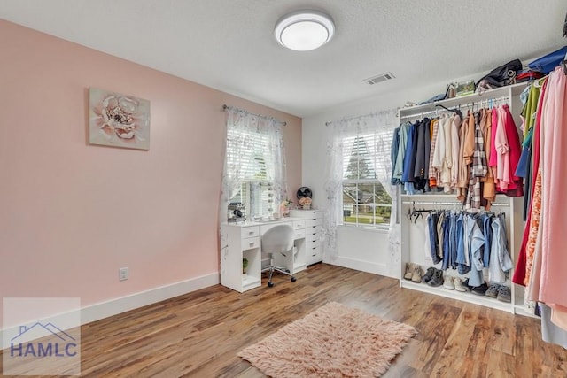 interior space with hardwood / wood-style floors