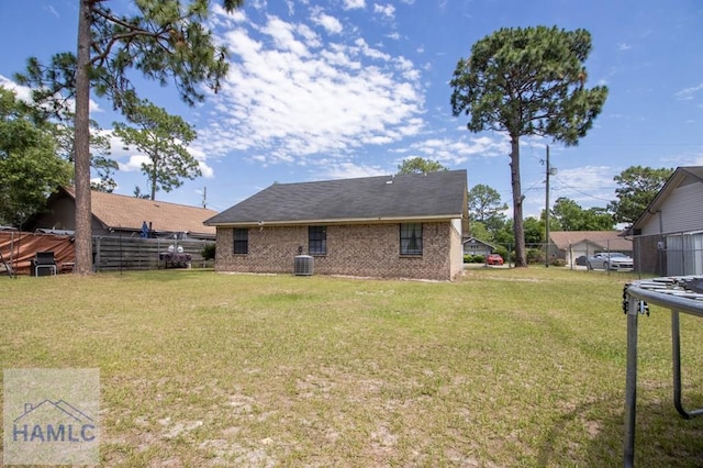 776 Madison Dr, Hinesville, GA 31313 - rear view of house with central air condition unit and brick siding