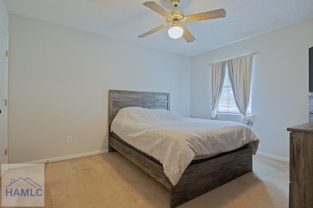 776 Madison Dr, Hinesville, GA 31313 - bedroom with light carpet, baseboards, and ceiling fan