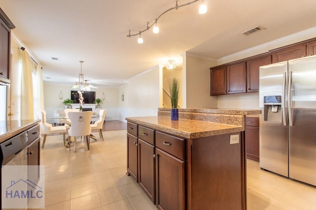 kitchen featuring visible vents, ornamental molding, a center island, hanging light fixtures, and stainless steel refrigerator with ice dispenser