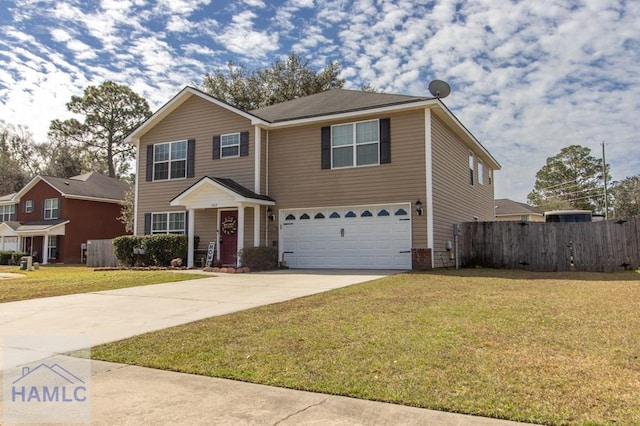 traditional-style home featuring a garage, a front yard, concrete driveway, and fence