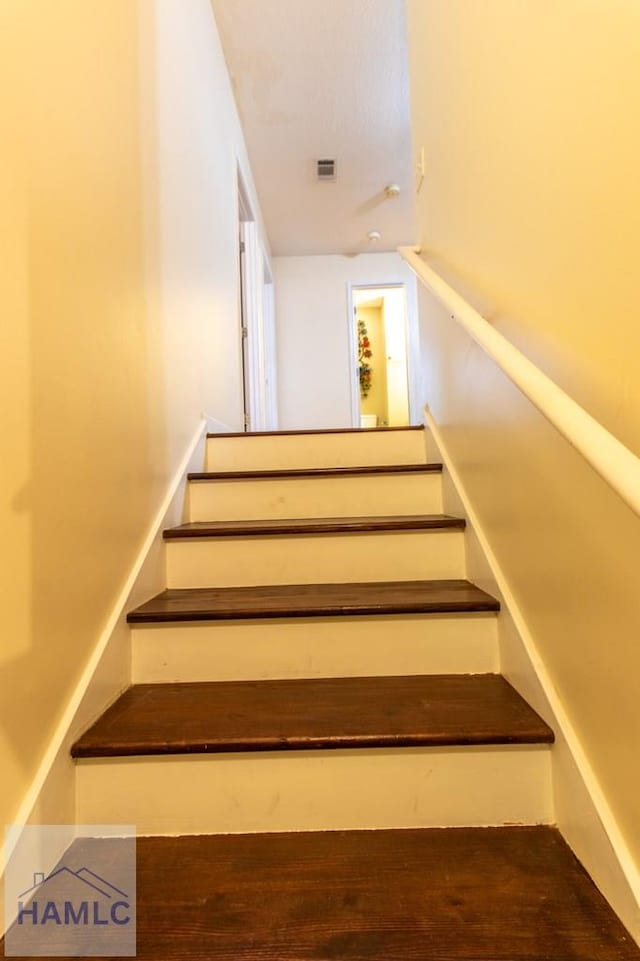 stairs featuring visible vents