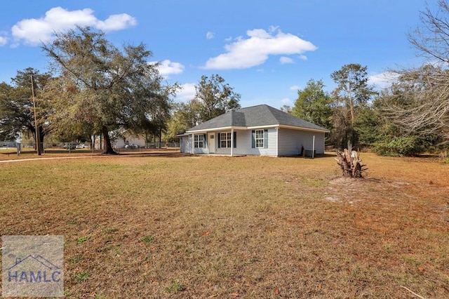 view of home's exterior with a yard